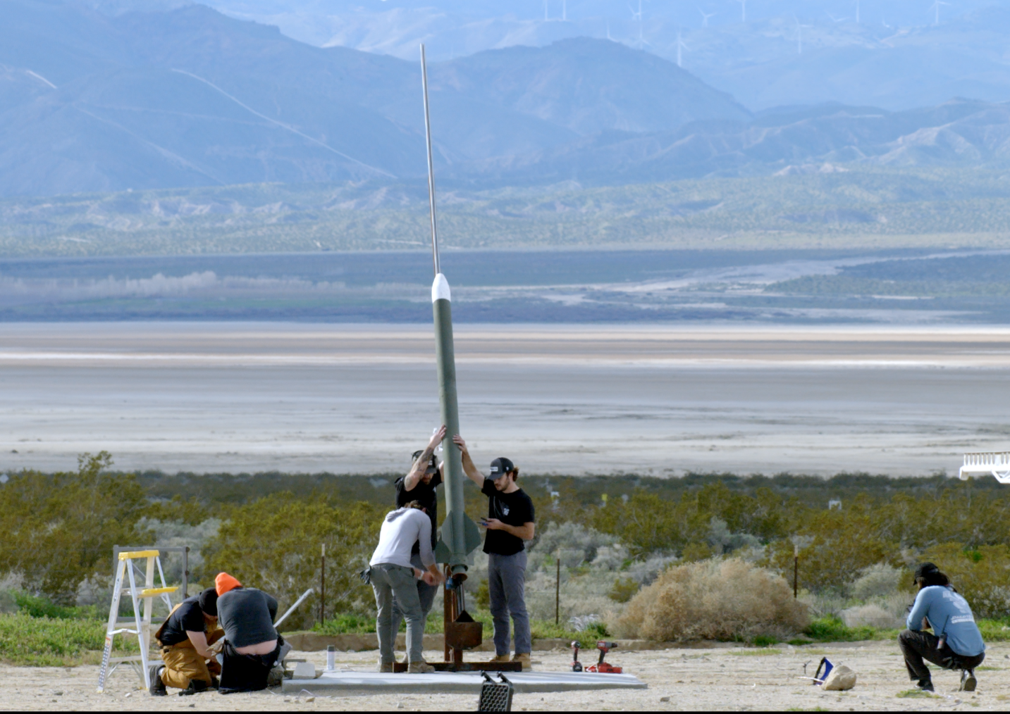 Furientis team preparing a flight test vehicle on the rail