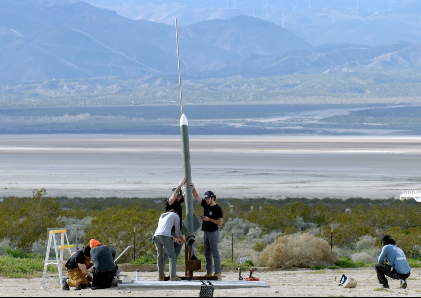 Furientis team preparing a flight test vehicle on the rail